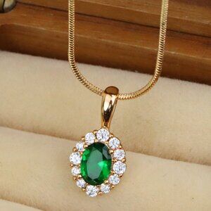 "Emerald Green Oval Pendant with Halo in Gold-Plated Brass Finish, XPPT1813